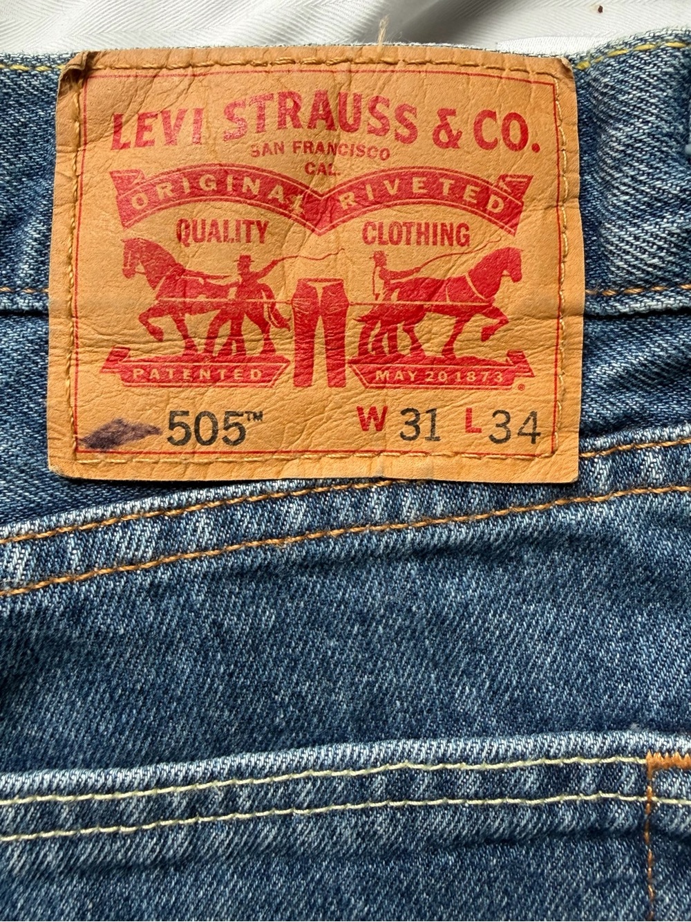 Levi's 505 Straight Leg Jeans in Medium Blue with Tan Patch